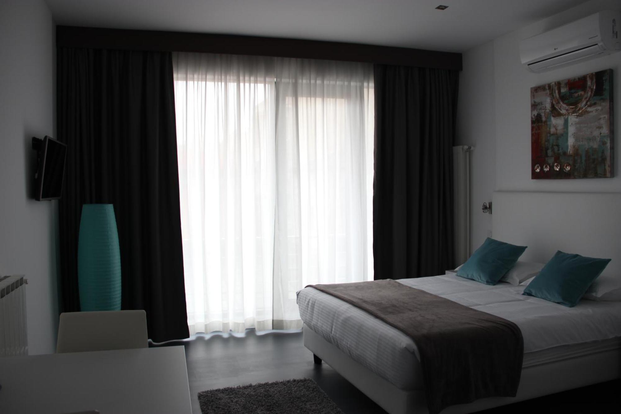 Living Aparthotel Bucarest Habitación foto
