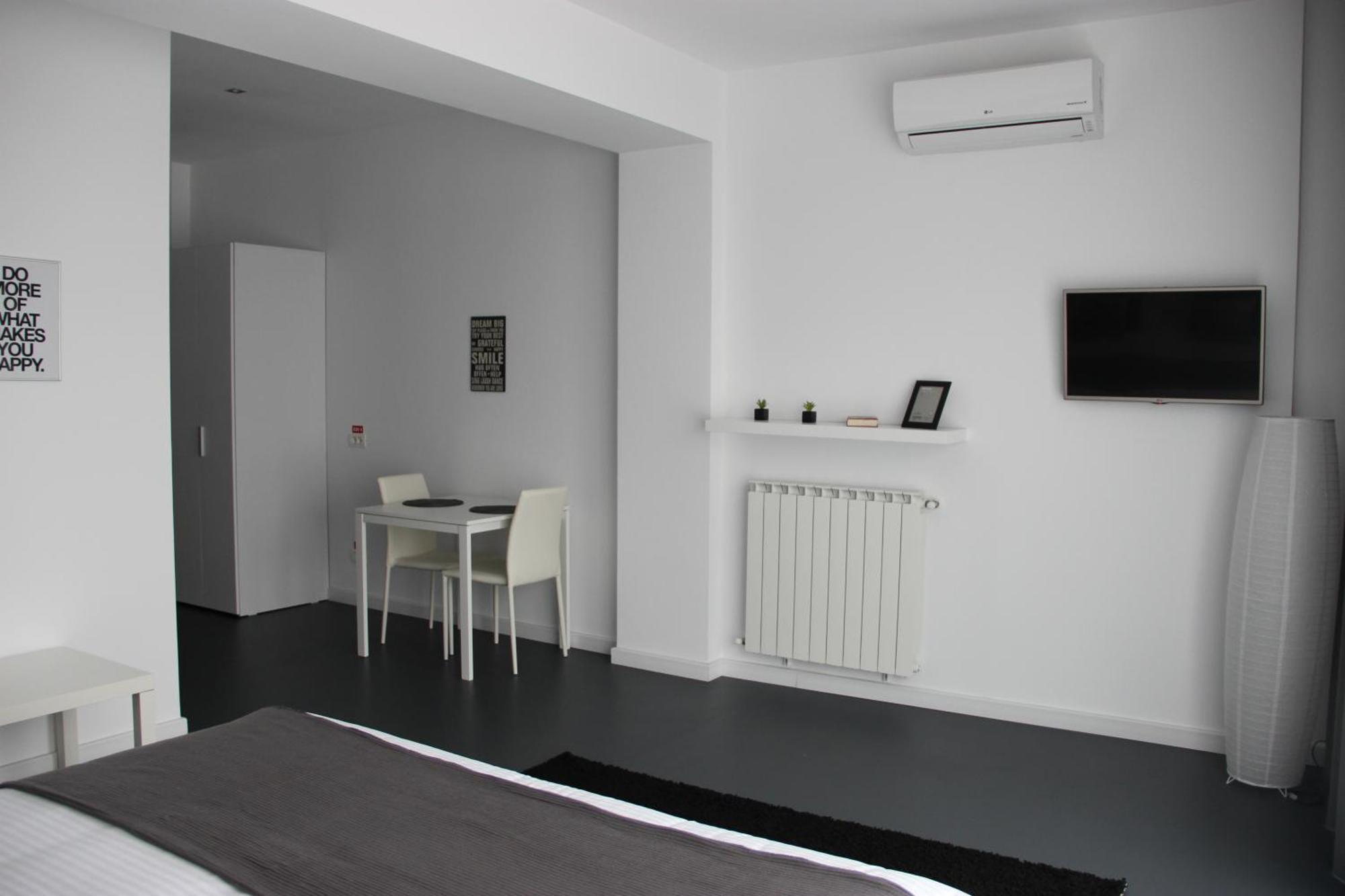 Living Aparthotel Bucarest Habitación foto